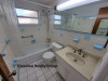 5145 Tammy Ln. Holiday, FL 34690 - Bath1_2a39a50ac0cc1d6a7d7fd997c6528a39