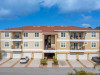 5041 Royal Palms Way #203 New Port Richey, FL 34652 - Front_50bb4923dcd5fa288fb74db14f85323e