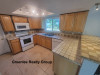 7741 Treasure Point. Port Richey, FL 34668 - Kitchen2_7c672d6d0d25244ee223dd8471de467a