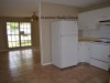 7232 Daggett Terrace, New Port Richey, FL 34655 - Kitchen_Living_2fe1f5235162f0172258e5fca9e45b30
